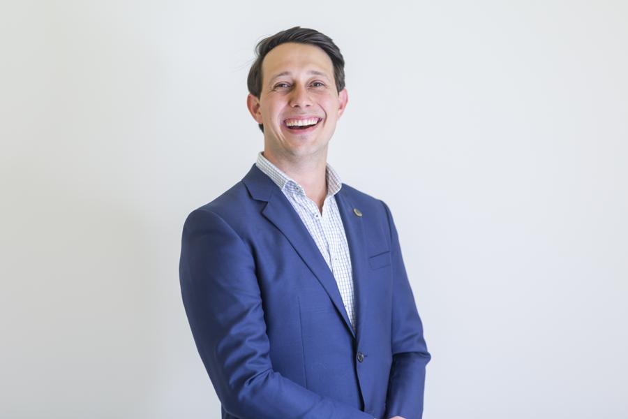 Professional headshot against a clean backdrop