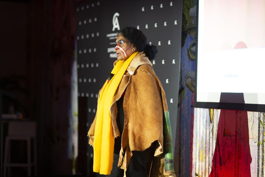 Presenter on stage at an awards event
